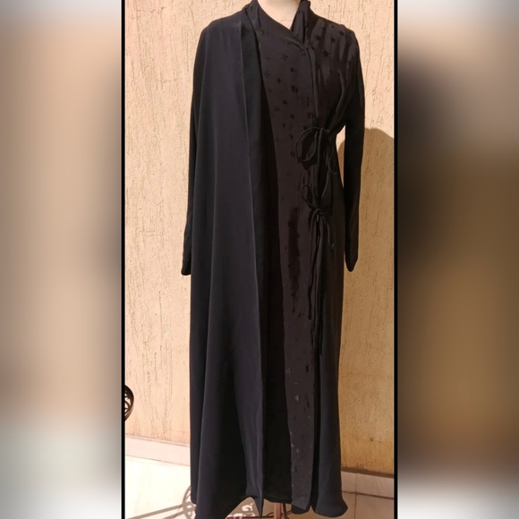 Elegant Black Dress with Colorful Embellishments - Picture 2 of 8